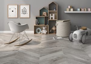 room with gray porcelain wood look tile