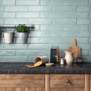 kitchen with blue handmade look backsplash
