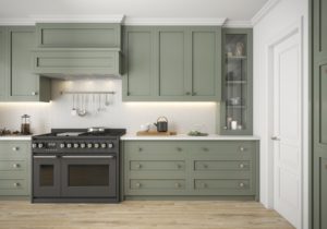 green kitchen with white picket mosaic tile backsplash