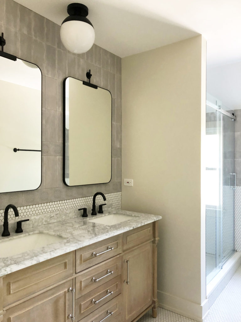 bathroom with solid colors tile and white mosaics 