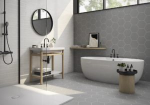 bathroom shower wall with gray hexagon ceramic tile
