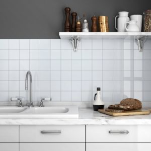 kitchen with white ceramic backsplash 