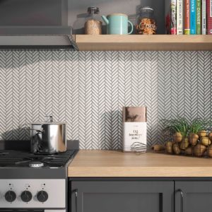 Kitchen with porcelain herringbone backsplash white bright mosaics