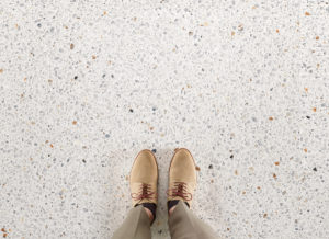 floor with white terrazzo look porcelain tile